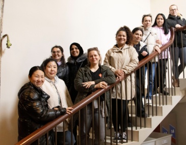 14 Henrietta Street A community group pose on the stairs of 14 Henrietta Street 800 x 540
