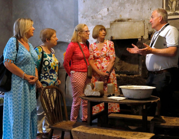 Open Call Sean a tour guide at 14 Henrietta Street explains the history of the building to people on a tour 800 x 540