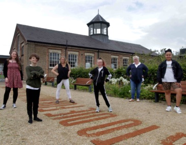 Dervilia and group in the garden