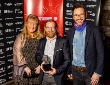 Participant Michele Walsh with artists Steve MacDevitt and Ben Readman at the IDI Awards 2021.