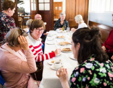 People sitting around a table chatting