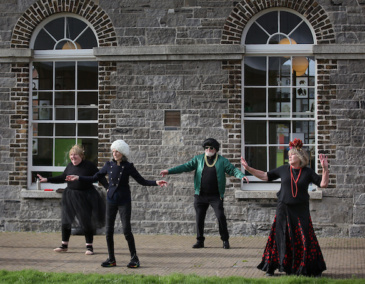 The group dancing in the Richmond Barracks Garden