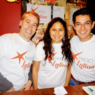 Silvia and two of her colleagues wearing Radio Latina T Shirts and smiling