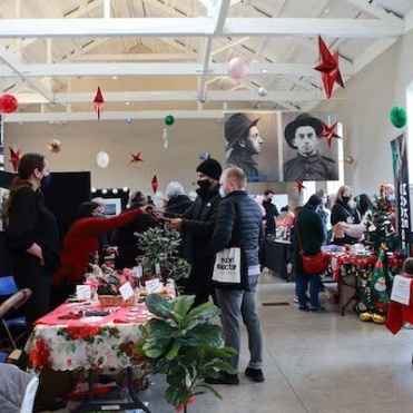 Visitors browse stalls at the Richmond Barracks Christmas Craft Fair