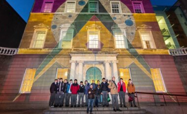The class and artist Steve McDevitt with their artwork. Photo: Dan Butler