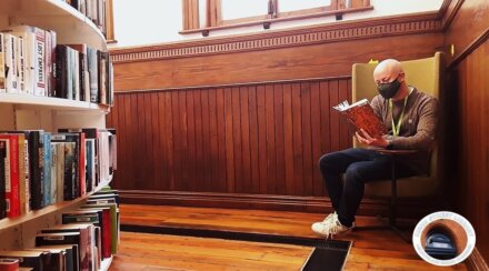 Chris reading in the library. Photo: Ciarán Hurley