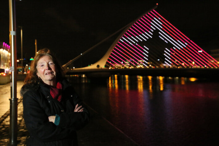 Participant Christine Ryan in front of the Samuel Beckett Bridge artwork. Photo: Mark Stedman