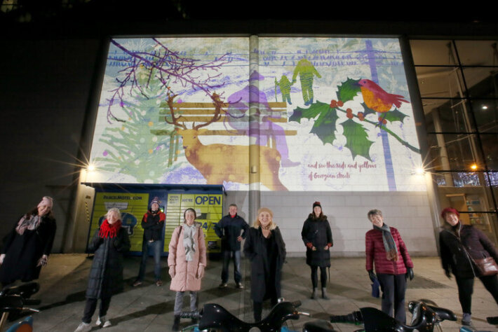 The group with their finished artwork. Photo: Mark Stedman