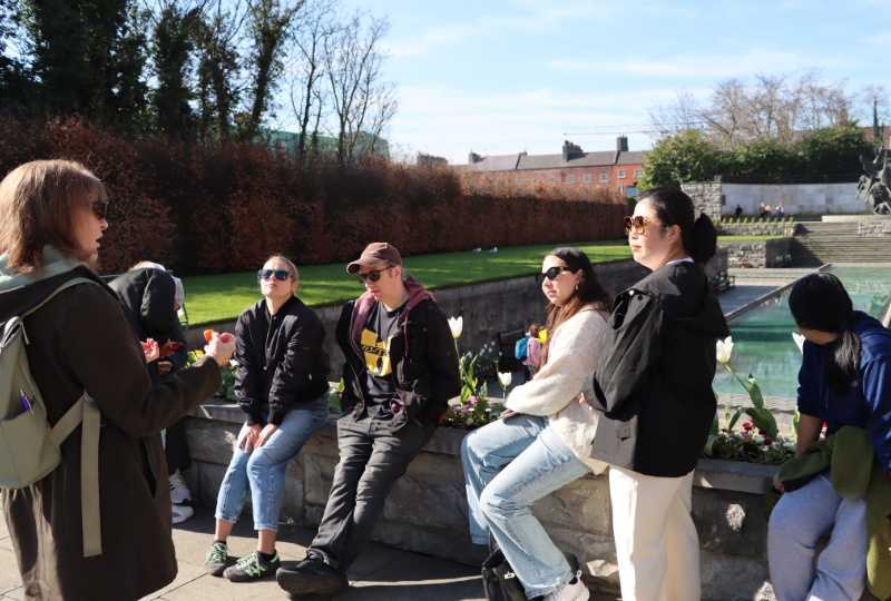 Tea and Chats A group of people with Historian In Residence on a walking tour in the Gardens of Remembrance Dublin Hill Street FRC Walking Tour 20250408 800x540