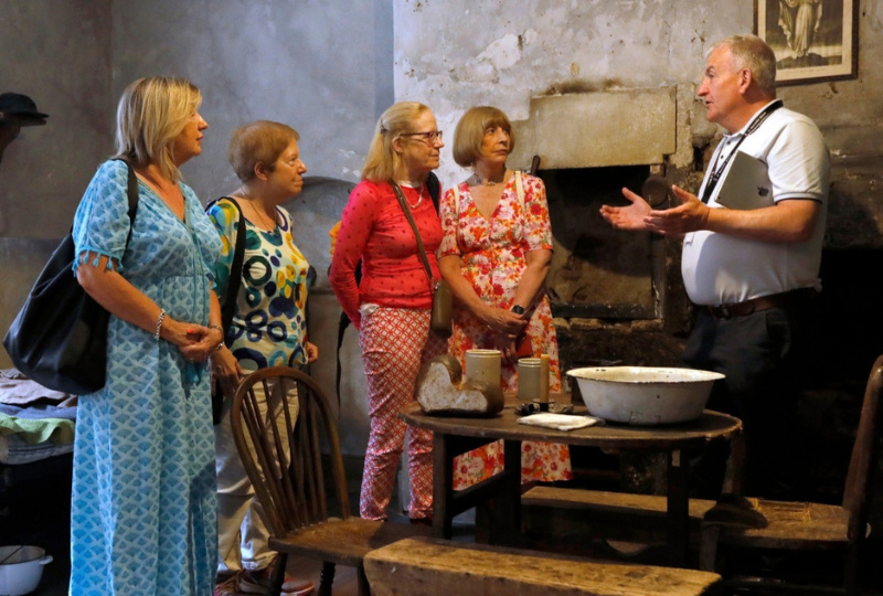 Open Call Sean a tour guide at 14 Henrietta Street explains the history of the building to people on a tour 800 x 540