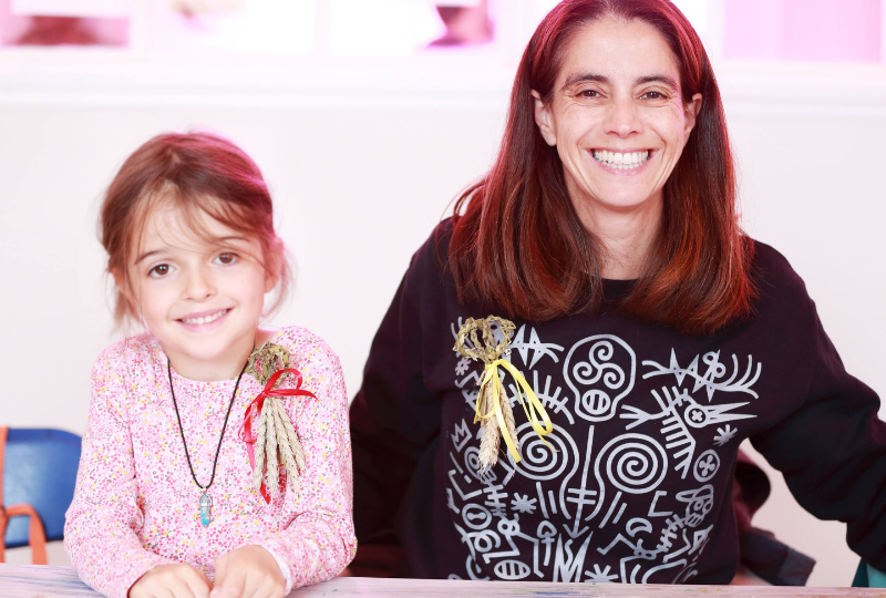 Bright smiles at a Culture Connects workshop at a Richmond Barracks Fair. Photo: Senija Topcic