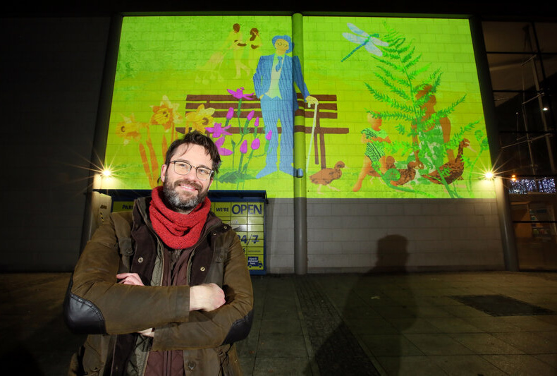 Ben Readman with the finished artwork on the Mater. Photo: Mark Stedman