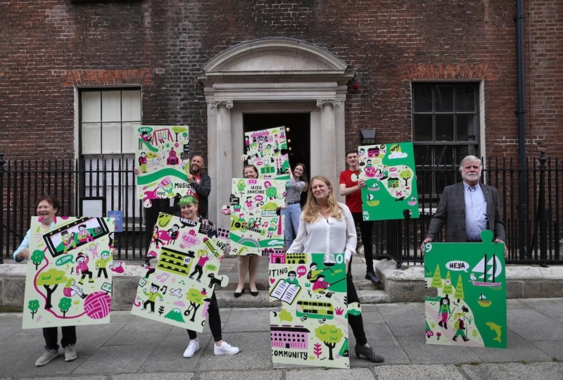 Group with the jigsaw outside 14 Henrietta Street