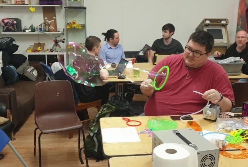 Jeffrey testing a bubble machine at a Tog event
