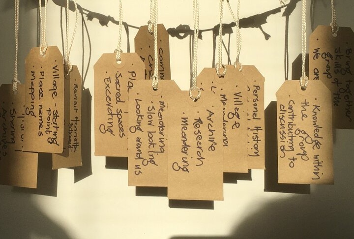 Luggage tags with ideas that informed the artwork