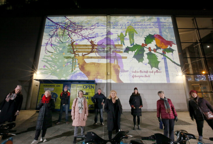 The group with their finished artwork. Photo: Mark Stedman